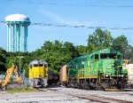 CFWR 105 and 3002 pose with the McMinnville Water Tower